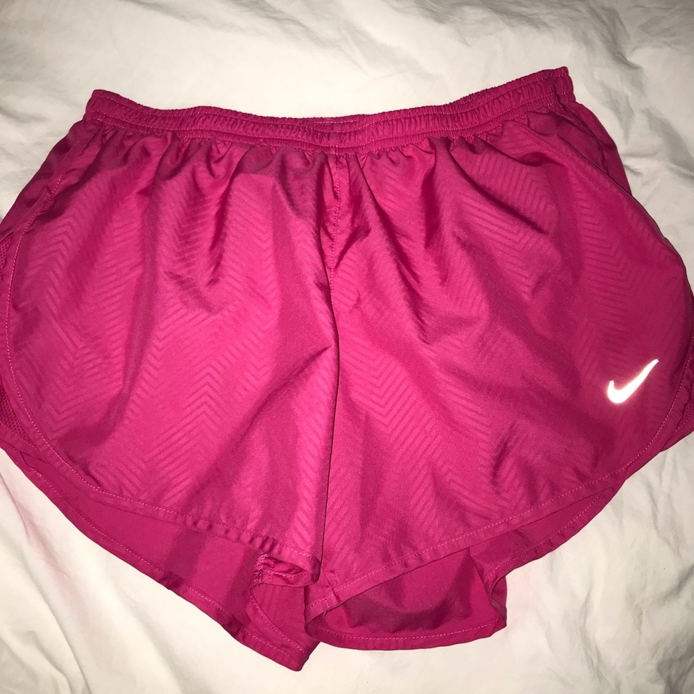 Pink nike running shorts